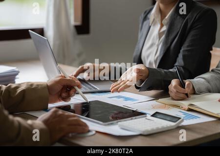Fund managers team consultation and discuss about analysis Investment stock market Stock Photo