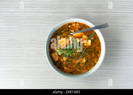 Japanese Mapo Tofu (Mabo Dofu) made with ground pork, tofu and onions served in a fragrant miso and spicy sauce. Top View Stock Photo