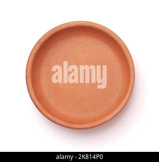 Top view of empty round clay baking pan isolated on white Stock Photo