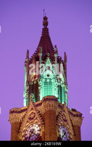 India: The Rajabai Clock Tower, University of Mumbai, Fort campus, Mumbai, built in so-called‚ Bombay Gothic style. The University of Bombay, as it was originally known, was established in 1857. The Rajabai Tower and library building were designed by Sir George Gilbert Scott and completed in 1878. Stock Photo