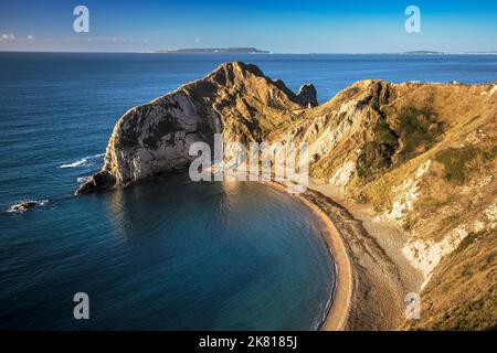 View over Man O'War Beach in Dorset looking west at sunrise. Stock Photo