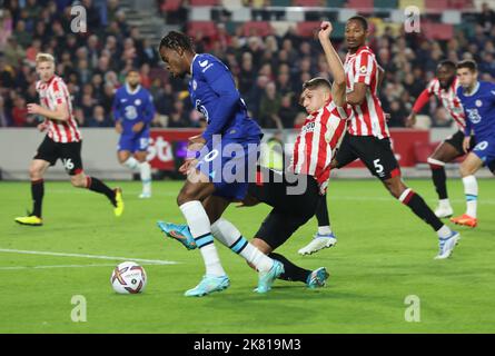 Brentford ENGLAND - October 19: L-R Chelsea's Carney Chukwuemeka and Vitaly Janelt of Brentford  during English Premier League soccer match between Br Stock Photo