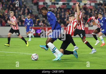 Brentford ENGLAND - October 19: L-R Chelsea's Carney Chukwuemeka and Vitaly Janelt of Brentford  during English Premier League soccer match between Br Stock Photo