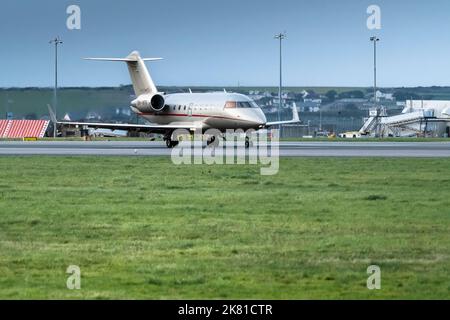 A Bombardier Challenger 605 9H-VFF Vista Jet on the runway at Newquay Airport in Cornwall in the UK. Stock Photo