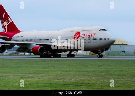 The long awaited arrival of the Virgin Orbit, Cosmic Girl, a 747-400 converted to a rocket launch platform at the Spaceport Cornwall in Newquay, Engla Stock Photo