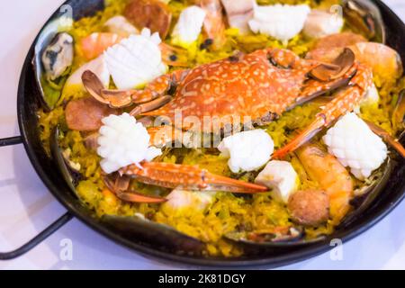 Filipino paella dish at a local restaurant in Davao City, Philippines Stock Photo