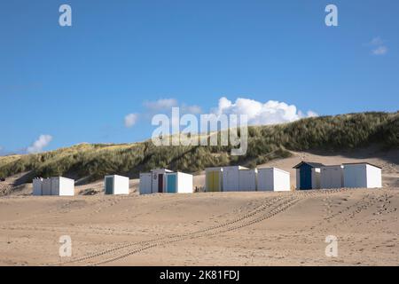 beach cabins on the beach in Oostkapelle on the peninsula Walcheren, Zeeland, Netherlands. Strandhaeuschen am Strand von Oostkapelle auf Walcheren, Ze Stock Photo