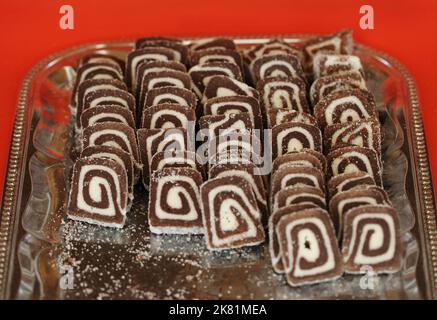 Slices of chocolate and coconut roll cake Stock Photo