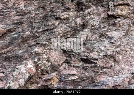 Stone texture in an old marble quarry near the village of Peteny, Novosibirsk region; Stock Photo