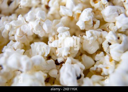Heap of fresh made popcorn in machine Stock Photo