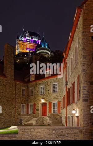 QUEBEC, CANADA, October 8, 2022 :  Maison Chevalier under the Chateau in Petit Champlain district by night. The district is named after Samuel de Cham Stock Photo