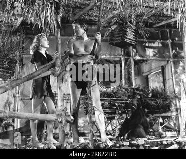 Brenda Joyce & Johnny Weissmuller Film: Tarzan And The Leopard Woman (USA 1946) Characters: Jane, Tarzan  Director: Kurt Neumann 08 January 1946   **WARNING** This Photograph is for editorial use only and is the copyright of RKO and/or the Photographer assigned by the Film or Production Company and can only be reproduced by publications in conjunction with the promotion of the above Film. A Mandatory Credit To RKO is required. The Photographer should also be credited when known. No commercial use can be granted without written authority from the Film Company. Stock Photo