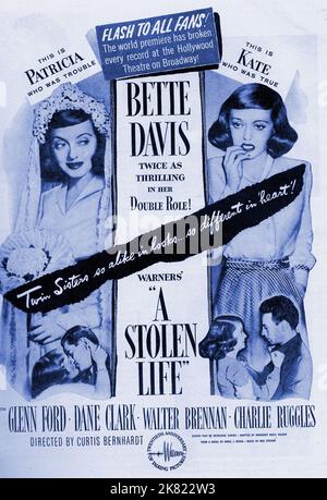 Bette Davis  Film Poster  Film A Stolen Life (1942)   Director: Curtis Bernhardt 06 July 1946   **WARNING** This Photograph is for editorial use only and is the copyright of WARNER BROS and/or the Photographer assigned by the  Film or Production Company and can only be reproduced by publications in conjunction with the promotion of the above  Film. A Mandatory Credit To WARNER BROS is required. The Photographer should also be credited when known. No commercial use can be granted without written authority from the  Film Company. Stock Photo