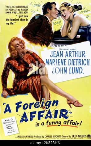 Marlene Dietrich, John Lund & Jean Arthur Poster Film: A Foreign Affair (1942) Characters: Erika Von Schluetow,Captain John Pringle &  Director: Billy Wilder 30 June 1948   **WARNING** This Photograph is for editorial use only and is the copyright of PARAMOUNT and/or the Photographer assigned by the Film or Production Company and can only be reproduced by publications in conjunction with the promotion of the above Film. A Mandatory Credit To PARAMOUNT is required. The Photographer should also be credited when known. No commercial use can be granted without written authority from the Film Compa Stock Photo