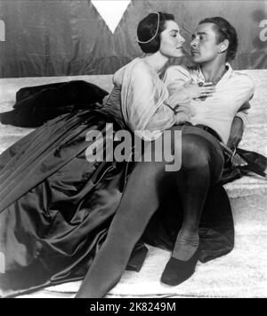 Viveca Lindfors & Errol Flynn Film: Adventures Of Don Juan (USA 1948) Characters: Queen Margaret, Don Juan  Director: Vincent Sherman 01 December 1948   **WARNING** This Photograph is for editorial use only and is the copyright of WARNER BROS. and/or the Photographer assigned by the Film or Production Company and can only be reproduced by publications in conjunction with the promotion of the above Film. A Mandatory Credit To WARNER BROS. is required. The Photographer should also be credited when known. No commercial use can be granted without written authority from the Film Company. Stock Photo