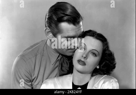 Clark Gable & Hedy Lamarr Film: Boom Town (USA 1940) Characters: Big John McMasters, Karen Vanmeer  Director: Jack Conway 30 August 1940   **WARNING** This Photograph is for editorial use only and is the copyright of MGM and/or the Photographer assigned by the Film or Production Company and can only be reproduced by publications in conjunction with the promotion of the above Film. A Mandatory Credit To MGM is required. The Photographer should also be credited when known. No commercial use can be granted without written authority from the Film Company. Stock Photo