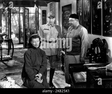 Katharine Hepburn & Turhan Bey Film: Dragon Seed (1944) Characters: Jade Tan, Lao Er Tan - Middle Son  Director: Harold S. Bucquet 20 July 1944   **WARNING** This Photograph is for editorial use only and is the copyright of MGM and/or the Photographer assigned by the Film or Production Company and can only be reproduced by publications in conjunction with the promotion of the above Film. A Mandatory Credit To MGM is required. The Photographer should also be credited when known. No commercial use can be granted without written authority from the Film Company. Stock Photo