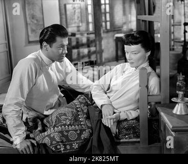 Turhan Bey & Katharine Hepburn Film: Dragon Seed (1944) Characters: Lao Er Tan - Middle Son, Jade Tan  Director: Harold S. Bucquet 20 July 1944   **WARNING** This Photograph is for editorial use only and is the copyright of MGM and/or the Photographer assigned by the Film or Production Company and can only be reproduced by publications in conjunction with the promotion of the above Film. A Mandatory Credit To MGM is required. The Photographer should also be credited when known. No commercial use can be granted without written authority from the Film Company. Stock Photo