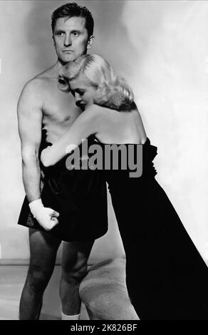 Kirk Douglas & Marilyn Maxwell Film: Champion (USA 1956) Characters: Michael 'Midge' Kelly & Grace Diamond  Director: Mark Robson 09 April 1949   **WARNING** This Photograph is for editorial use only and is the copyright of UNITED ARTISTS and/or the Photographer assigned by the Film or Production Company and can only be reproduced by publications in conjunction with the promotion of the above Film. A Mandatory Credit To UNITED ARTISTS is required. The Photographer should also be credited when known. No commercial use can be granted without written authority from the Film Company. Stock Photo