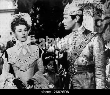 Rex Harrison & Irene Dunne Film: Anna And The King Of Siam (1940) Characters: King Mongkut & Anna Owens  Director: John Cromwell 20 June 1946   **WARNING** This Photograph is for editorial use only and is the copyright of 20 CENTURY FOX and/or the Photographer assigned by the Film or Production Company and can only be reproduced by publications in conjunction with the promotion of the above Film. A Mandatory Credit To 20 CENTURY FOX is required. The Photographer should also be credited when known. No commercial use can be granted without written authority from the Film Company. Stock Photo