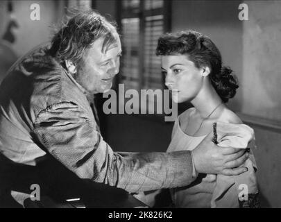 Charles Laughton & Ava Gardner Film: The Bribe (USA 1949) Characters: J.J. Bealer & Elizabeth Hintten  Director: Robert Z. Leonard 03 February 1949   **WARNING** This Photograph is for editorial use only and is the copyright of MGM and/or the Photographer assigned by the Film or Production Company and can only be reproduced by publications in conjunction with the promotion of the above Film. A Mandatory Credit To MGM is required. The Photographer should also be credited when known. No commercial use can be granted without written authority from the Film Company. Stock Photo