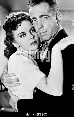 Humphrey Bogart & Ida Lupino Film: High Sierra (USA 1941) Characters: Roy Earle & Marie  / Literaturverfilmung (Based On The Book By W.R. Burnett) Director: Raoul Walsh 23 January 1941   **WARNING** This Photograph is for editorial use only and is the copyright of WARNER BROS. and/or the Photographer assigned by the Film or Production Company and can only be reproduced by publications in conjunction with the promotion of the above Film. A Mandatory Credit To WARNER BROS. is required. The Photographer should also be credited when known. No commercial use can be granted without written authority Stock Photo