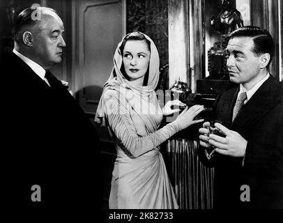 Sydney Greenstreet, Geraldine Fitzgerald, Peter Lorre Film: Three Strangers (1943) Characters: Jerome K. Arbutny,Crystal Shackleford,Johnny West  Director: Jean Negulesco 28 January 1946   **WARNING** This Photograph is for editorial use only and is the copyright of WARNER BROS and/or the Photographer assigned by the Film or Production Company and can only be reproduced by publications in conjunction with the promotion of the above Film. A Mandatory Credit To WARNER BROS is required. The Photographer should also be credited when known. No commercial use can be granted without written authority Stock Photo