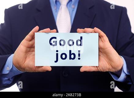 Business man hold paper good job text on it Stock Photo