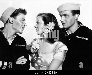 Frank Sinatra, Kathryn Grayson & Gene Kelly Film: Anchors Aweigh (1945) Characters: Clarence Doolittle, Susan Abbott, Joseph Brady  Director: George Sidney 14 July 1945   **WARNING** This Photograph is for editorial use only and is the copyright of The Film Company and/or the Photographer assigned by the Film or Production Company and can only be reproduced by publications in conjunction with the promotion of the above Film. A Mandatory Credit To The Film Company is required. The Photographer should also be credited when known. No commercial use can be granted without written authority from th Stock Photo