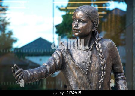 Life size bronze statue of young Swedish environmental activist Greta Thunberg. Created by Artist Christine Charlesworth. Winchester University, UK. Stock Photo