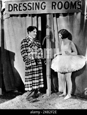 Charlie Chaplin & Merna Kennedy Film: The Circus (USA 1928) Characters: & His Step-daughter, A Circus Rider  Director: Charles Chaplin 06 January 1928   **WARNING** This Photograph is for editorial use only and is the copyright of CHARLES CHAPLIN PRODUCTIONS and/or the Photographer assigned by the Film or Production Company and can only be reproduced by publications in conjunction with the promotion of the above Film. A Mandatory Credit To CHARLES CHAPLIN PRODUCTIONS is required. The Photographer should also be credited when known. No commercial use can be granted without written authority fro Stock Photo