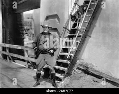 Rin Tin Tin  Film Tracked By Police (1927) Characters: Satan  01 May 1927   **WARNING** This Photograph is for editorial use only and is the copyright of WARNER BROS and/or the Photographer assigned by the  Film or Production Company and can only be reproduced by publications in conjunction with the promotion of the above  Film. A Mandatory Credit To WARNER BROS is required. The Photographer should also be credited when known. No commercial use can be granted without written authority from the  Film Company. Stock Photo