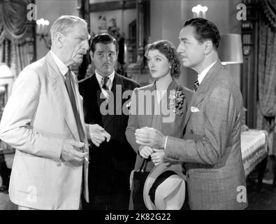 C. Aubrey Smith, Tom Neal, Myrna Loy & William Powell Film: Another Thin Man (USA 1939) Characters: Colonel Burr MacFay, Freddie Coleman, MacFay's Secretary, Nora Charles, Nick Charles  Director: W.S. Van Dyke 17 November 1939   **WARNING** This Photograph is for editorial use only and is the copyright of MGM and/or the Photographer assigned by the Film or Production Company and can only be reproduced by publications in conjunction with the promotion of the above Film. A Mandatory Credit To MGM is required. The Photographer should also be credited when known. No commercial use can be granted w Stock Photo