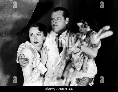 Fay Wray & Jack Holt Film: Black Moon (USA 1934) Characters: Gail Hamilton, Stephen Lane  Director: Roy William Neill 15 June 1934   **WARNING** This Photograph is for editorial use only and is the copyright of COLUMBIA PICTURES and/or the Photographer assigned by the Film or Production Company and can only be reproduced by publications in conjunction with the promotion of the above Film. A Mandatory Credit To COLUMBIA PICTURES is required. The Photographer should also be credited when known. No commercial use can be granted without written authority from the Film Company. Stock Photo