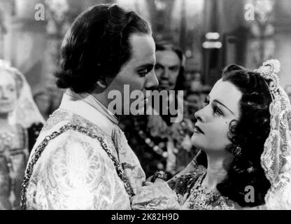 Louis Hayward & Joan Bennett Film: The Man In The Iron Mask (USA 1939) Characters: King Louis XIV & Princess Maria Theresa  Director: James Whale 26 June 1939   **WARNING** This Photograph is for editorial use only and is the copyright of UNITED ARTISTS and/or the Photographer assigned by the Film or Production Company and can only be reproduced by publications in conjunction with the promotion of the above Film. A Mandatory Credit To UNITED ARTISTS is required. The Photographer should also be credited when known. No commercial use can be granted without written authority from the Film Company Stock Photo