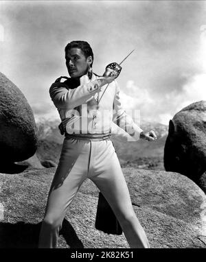 Errol Flynn Film: The Charge Of The Light Brigade (USA 1936) Characters: Major Geoffrey Vickers  / Titel Auch: 'Die Attacke Der Leichten Brigade' Director: Michael Curtiz 20 October 1936   **WARNING** This Photograph is for editorial use only and is the copyright of WARNER BROS. and/or the Photographer assigned by the Film or Production Company and can only be reproduced by publications in conjunction with the promotion of the above Film. A Mandatory Credit To WARNER BROS. is required. The Photographer should also be credited when known. No commercial use can be granted without written authori Stock Photo