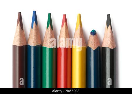 bunch of sharpened color pencils, used one with unused pencils isolated on white background Stock Photo