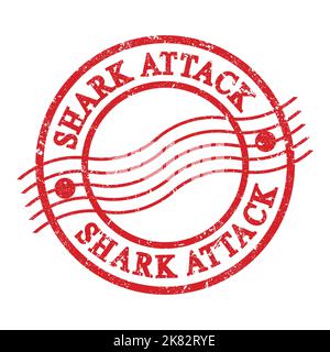 SHARK ATTACK, text written on red grungy postal stamp. Stock Photo