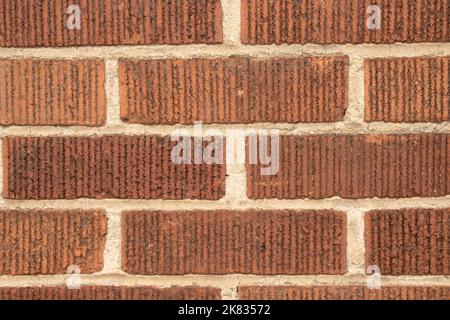 Close up of reddish brown brick wall background Stock Photo