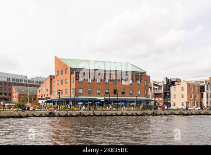 Harbor and waterfront at Fell's Point in Baltimore Maryland with buildings Stock Photo