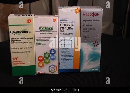 Packages of fluticasone propionate (a glucocorticoid) nasal spray from various countries (Netherlands, Ukraine, Bulgaria, Romania) w/ local brandnames Stock Photo