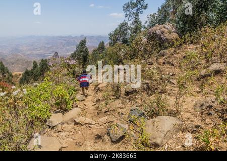 Armed scout in the mountains near Kosoye village, Ethiopia Stock Photo