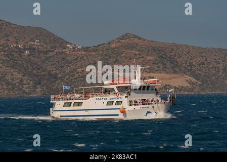 Agios Nikolaos, Crete, Greece. 2022. Tour boat returning to Agios Nikolaos with passengers from Spinalonga Island excursion. Stock Photo