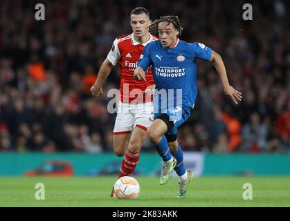 London, UK. 20th October 2022. Xavi Simons of PSV Eindhoven is challenged by Granit Xhaka of Arsenal during the UEFA Europa League match at the Emirates Stadium, London. Picture credit should read: Paul Terry / Sportimage Credit: Sportimage/Alamy Live News Stock Photo