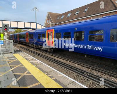 Datchet, Berkshire, UK. 19th October, 2022. A South Western Railway train at Datchet Station. The RMT have announced that further rail strikes will take place on 3rd, 5th and 7th November 2022. Rail employees are striking over pay, job losses and planned ticket office closures. Credit: Maureen McLean/Alamy Stock Photo