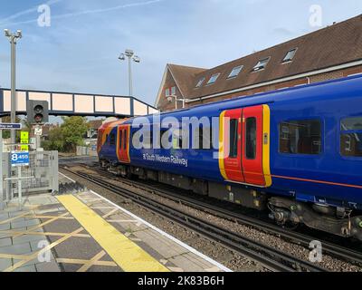 Datchet, Berkshire, UK. 19th October, 2022. A South Western Railway train at Datchet Station. The RMT have announced that further rail strikes will take place on 3rd, 5th and 7th November 2022. Rail employees are striking over pay, job losses and planned ticket office closures. Credit: Maureen McLean/Alamy Stock Photo