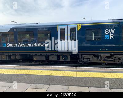 Datchet, Berkshire, UK. 19th October, 2022. A South Western Railway train at Datchet Station. The RMT have announced that further rail strikes will take place on 3rd, 5th and 7th November 2022. Rail employees are striking over pay, job losses and planned ticket office closures. Credit: Maureen McLean/Alamy Stock Photo