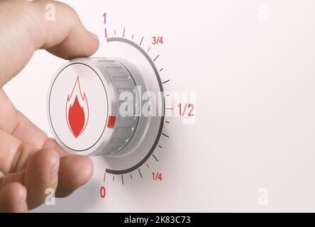 Man turning gas knob to reduce energy consumption. Composite image between a hand photography and a 3D background. Stock Photo