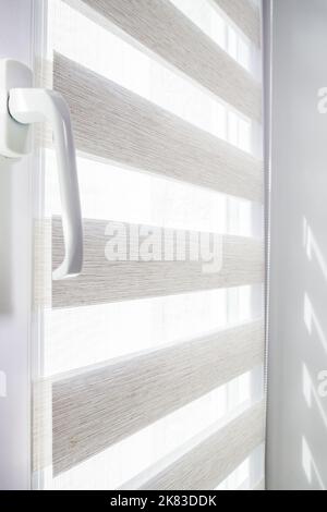 Window roller duo system day and night. Close up on roll curtains indoor Stock Photo