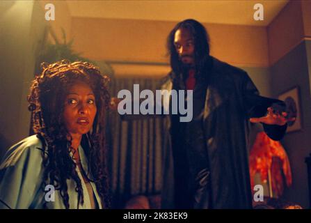 Pam Grier & Snoop Dogg Film: Bones (2001) Characters: Pearl, Jimmy Bones  Director: Ernest R. Dickerson 24 October 2001   **WARNING** This Photograph is for editorial use only and is the copyright of NEW LINE and/or the Photographer assigned by the Film or Production Company and can only be reproduced by publications in conjunction with the promotion of the above Film. A Mandatory Credit To NEW LINE is required. The Photographer should also be credited when known. No commercial use can be granted without written authority from the Film Company. Stock Photo